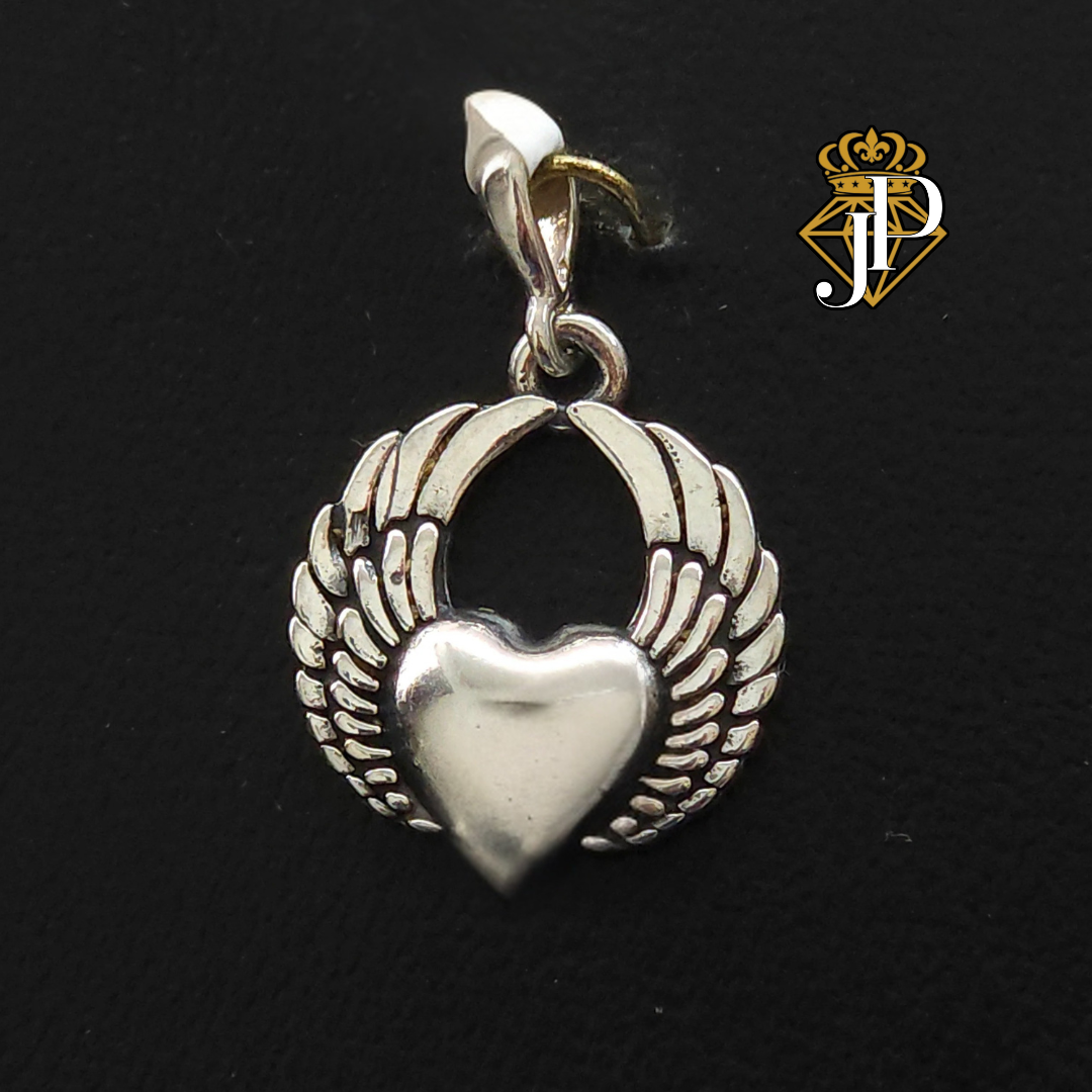 Dije de plata. Corazon con Alas