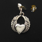 Dije de plata. Corazon con Alas