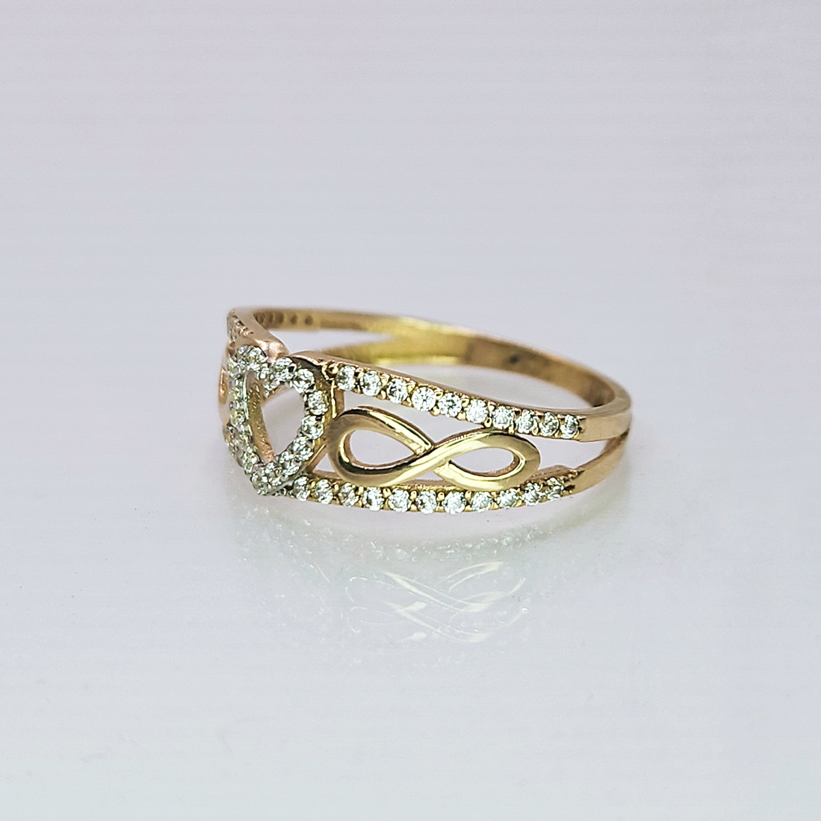 Anillo de oro. Corazon e Infinitos. Mod. 1850