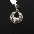 Dije de plata. Corazon con Alas