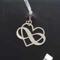 Dije de plata. Corazon con infinito