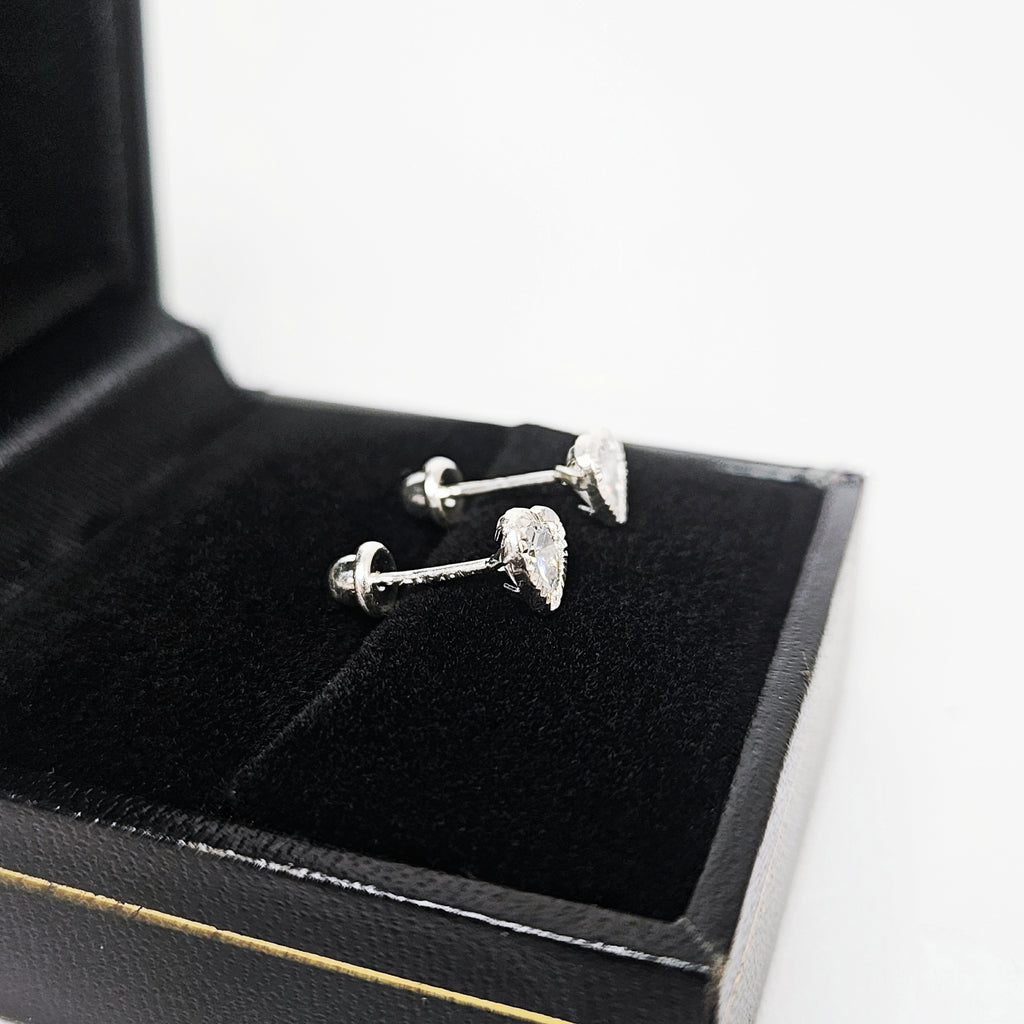 Aretes de Plata. Piedrita corazón y bisel diamantado
