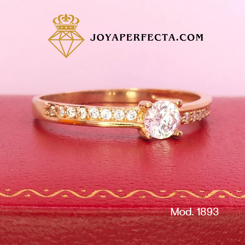 Anillo de oro. Zirconias laterales. Mod 1893