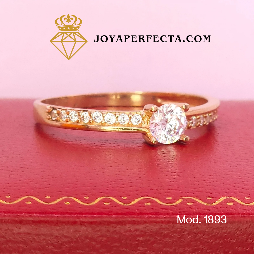 Anillo de oro. Zirconias laterales. Mod 1893