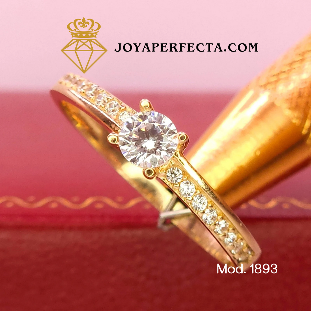 Anillo de oro. Zirconias laterales. Mod 1893