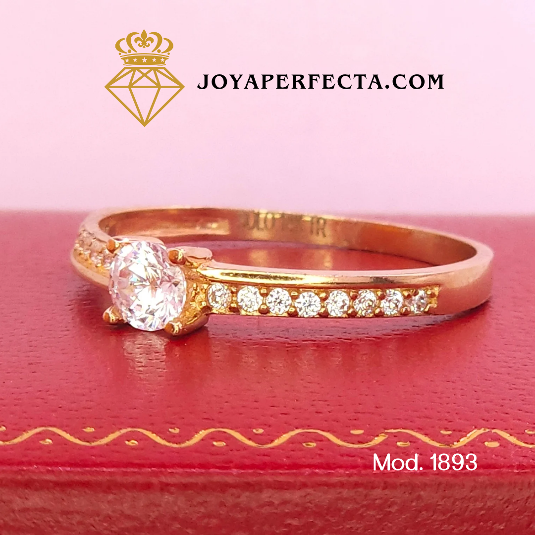 Anillo de oro. Zirconias laterales. Mod 1893