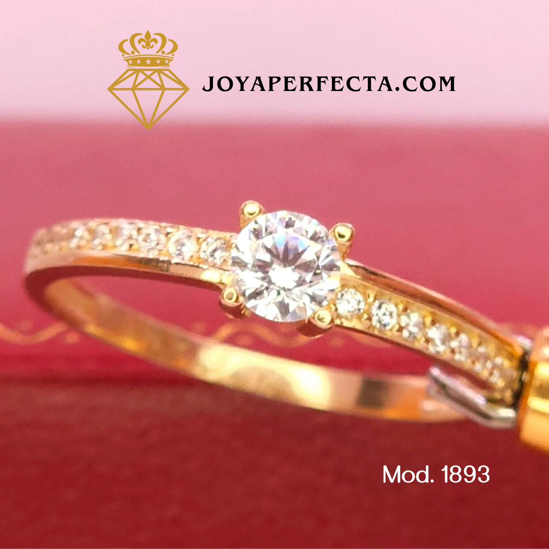 Anillo de oro. Zirconias laterales. Mod 1893