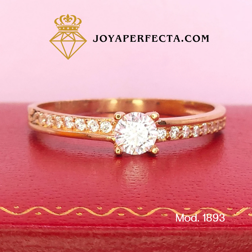 Anillo de oro. Zirconias laterales. Mod 1893